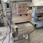 chain-type garlic peeler